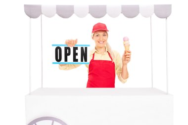 Female vendor holding an ice cream clipart