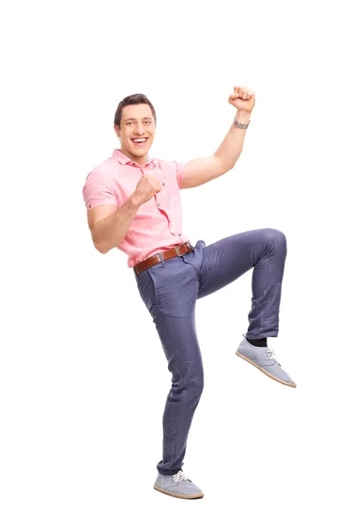 Excited young guy gesturing happiness — Stock Photo, Image