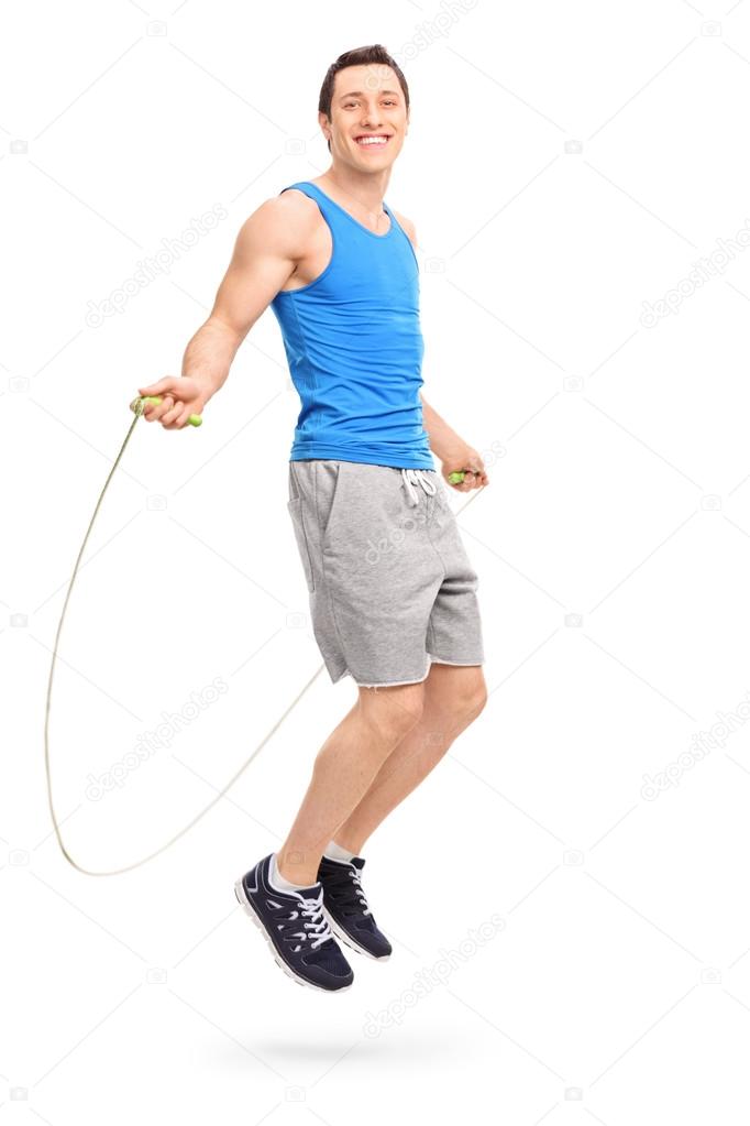 Young athlete exercising with a skipping rope 