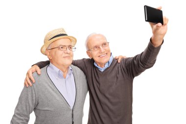 İki üst düzey erkek bir selfie alarak