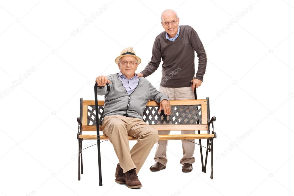 Old friends together sitting on a bench