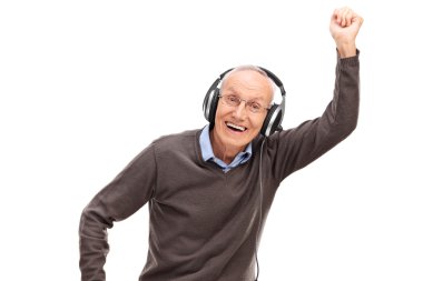 senior man listening to music on headphones clipart