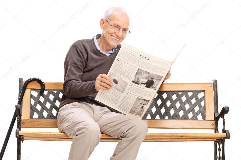Senior Man Reading A Newspaper On A Bench Stock Photo By C Ljsphotography Senior Man Reading A Newspaper On A Bench Stock Photo By C Ljsphotography