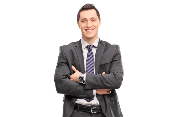 Confident young businessman in a gray suit — Stock Photo, Image