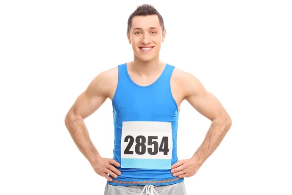 Young male runner in a blue jersey — Stock Photo, Image