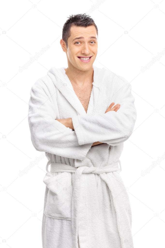 young guy posing in a white bathrobe