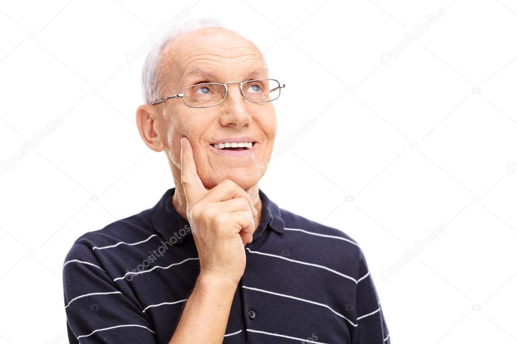 pensive senior man looking up a