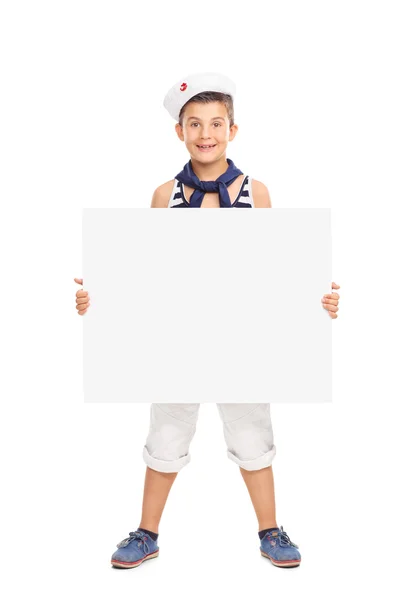 Niño en traje de marinero sosteniendo pancarta — Foto de Stock