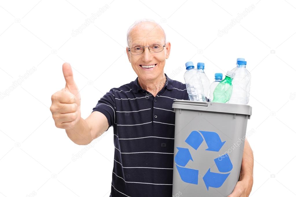 Senior holding a recycle bin