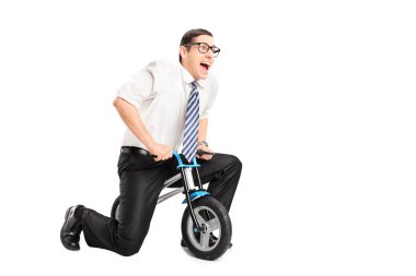 businessman riding a small bike clipart