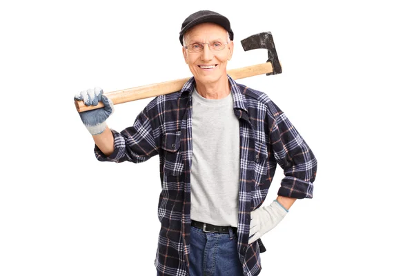 Cheerful senior logger holding an axe — Stock Photo, Image