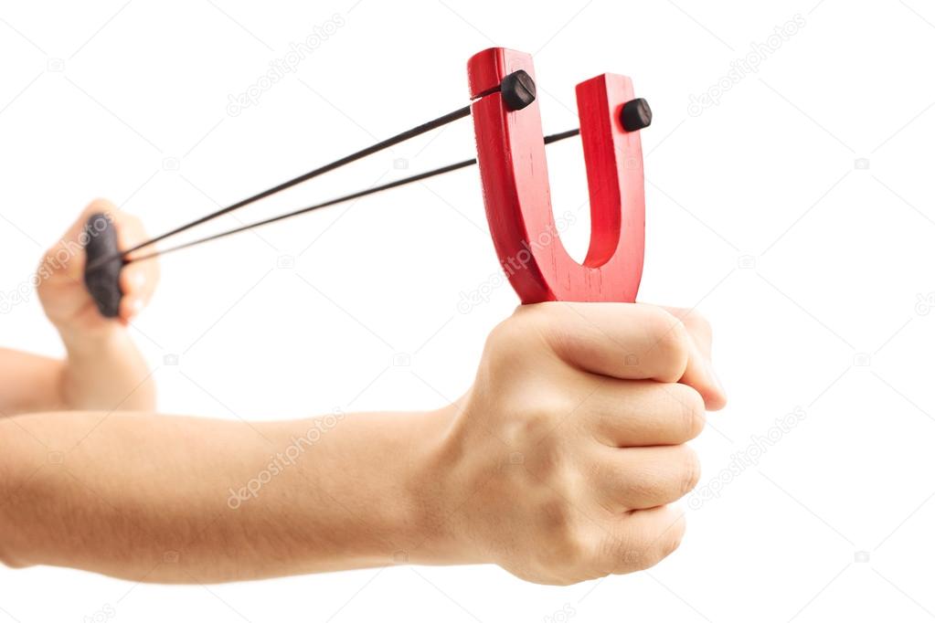 Hands holding a stretched slingshot