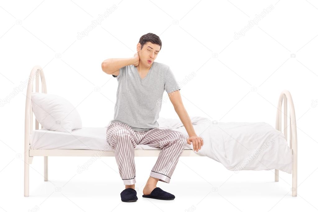 Man waking up with a neck pain
