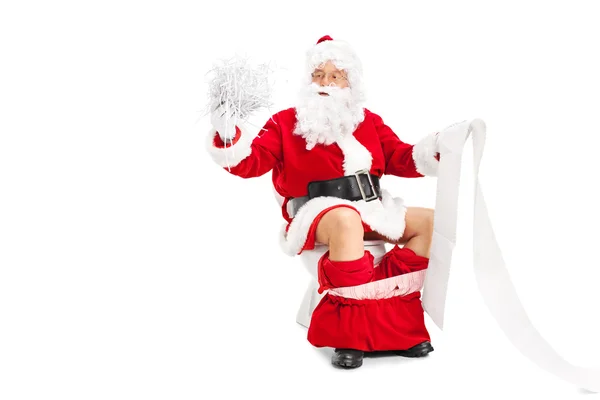 Babbo Natale in possesso di carta tagliuzzata — Foto Stock