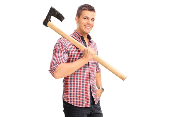 Young guy carrying an axe — Stock Photo, Image