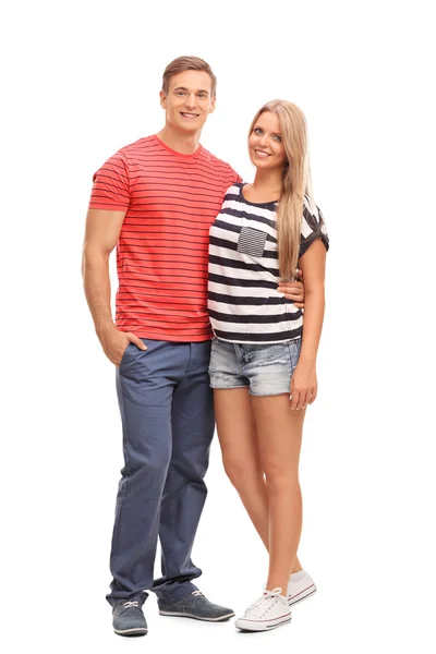 Casual young couple hugging and posing — Stockfoto