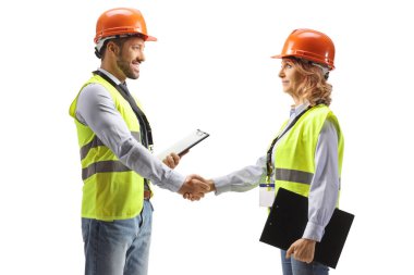 Profile shot of two engineers shaking hands isolated on white background
