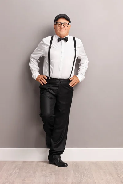 Fashionable senior gentleman with black suspenders — 스톡 사진