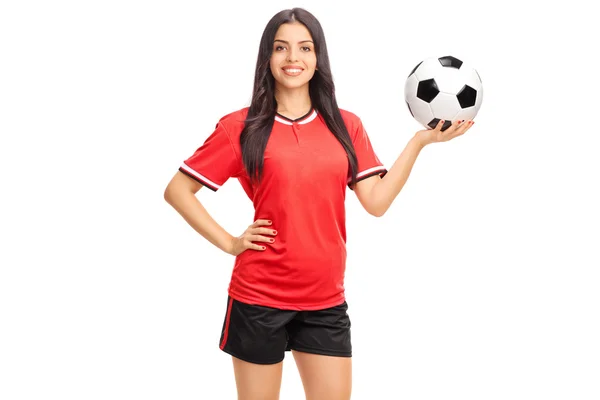 Female soccer player holding a ball — Stock Photo, Image