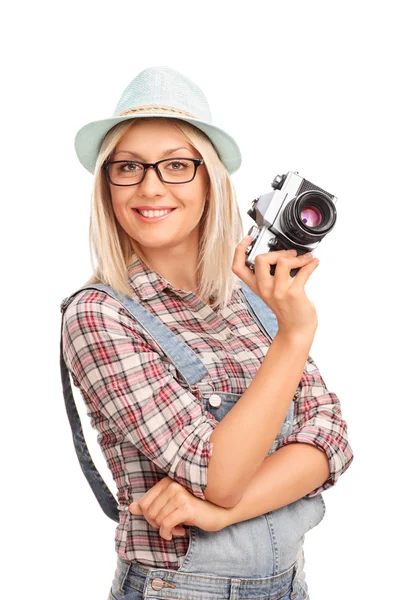 Female photographer holding a camera — Stock Photo, Image