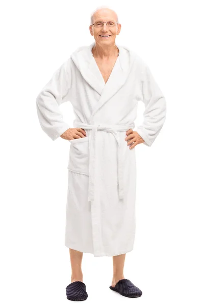 Relaxed senior man in a white bathrobe — Stock Fotó