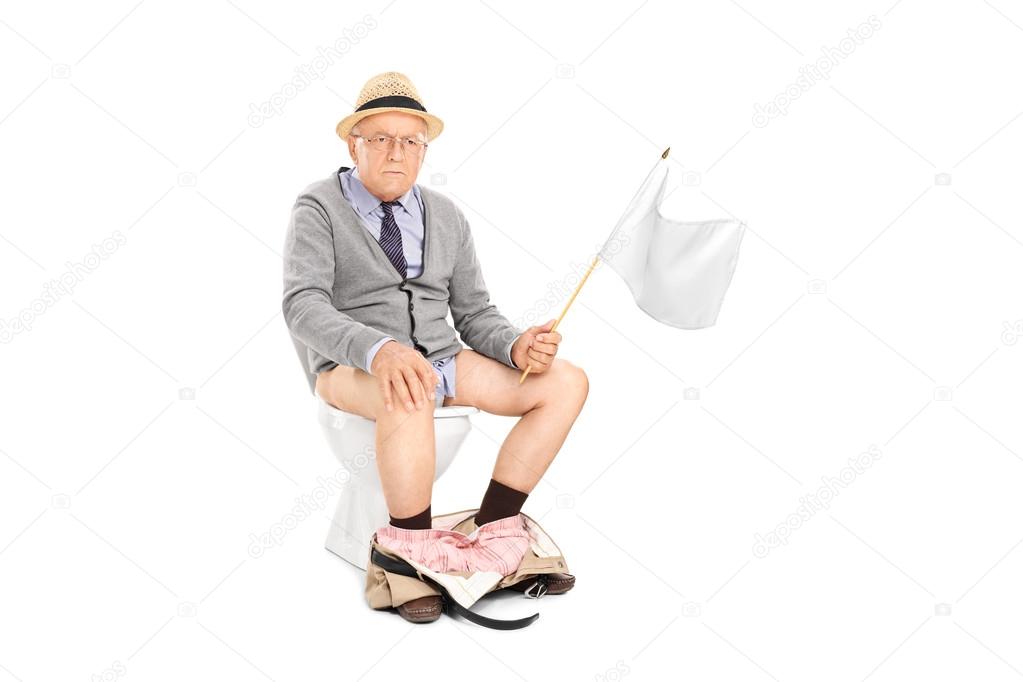 senior man waving a white flag
