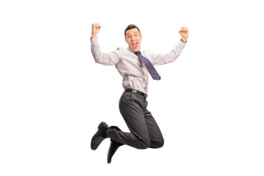 Overjoyed businessman jumping out of joy