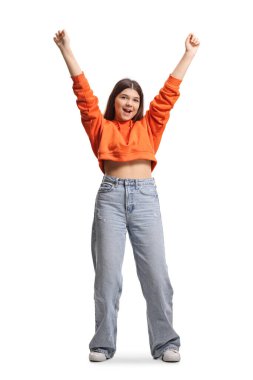 Beyaz arka planda elleri izole bir şekilde kutlama ve el kol hareketi yapan genç kız.