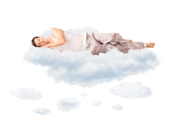 Junger fröhlicher Mann schläft auf einer Wolke — Stockfoto