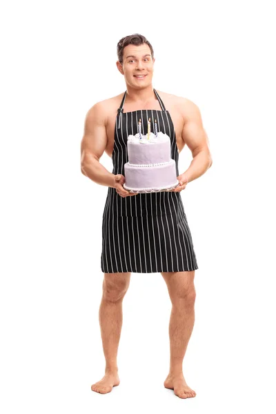Naked chef holding a birthday cake — Stock Photo, Image