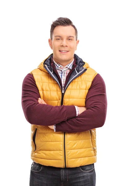 Young man wearing a yellow vest — Stockfoto