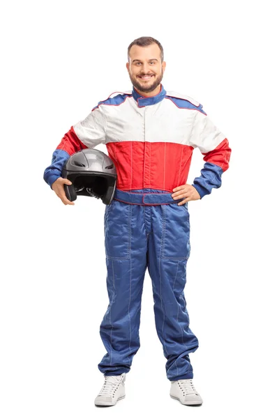 Male car racer holding a helmet — Zdjęcie stockowe