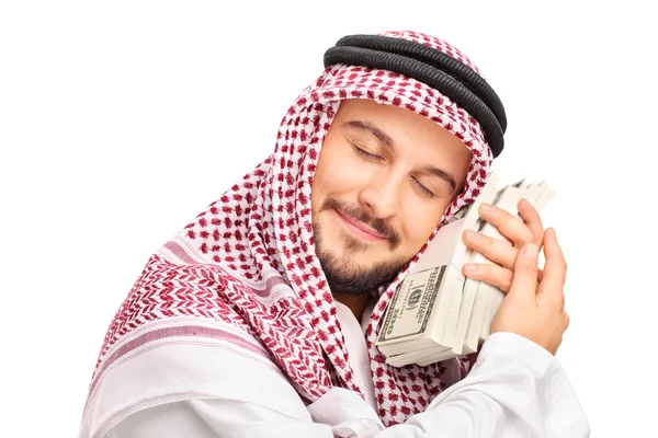 Manliga arabiska person sover på pengar — Stockfoto