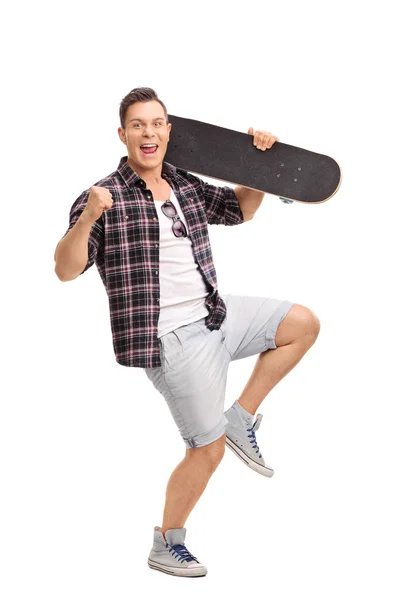 Delighted male skater gesturing happiness — Stok fotoğraf