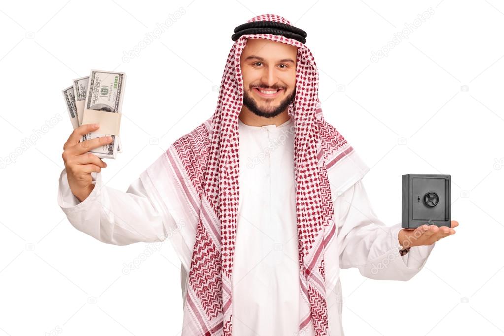 Arab holding money and a small safe