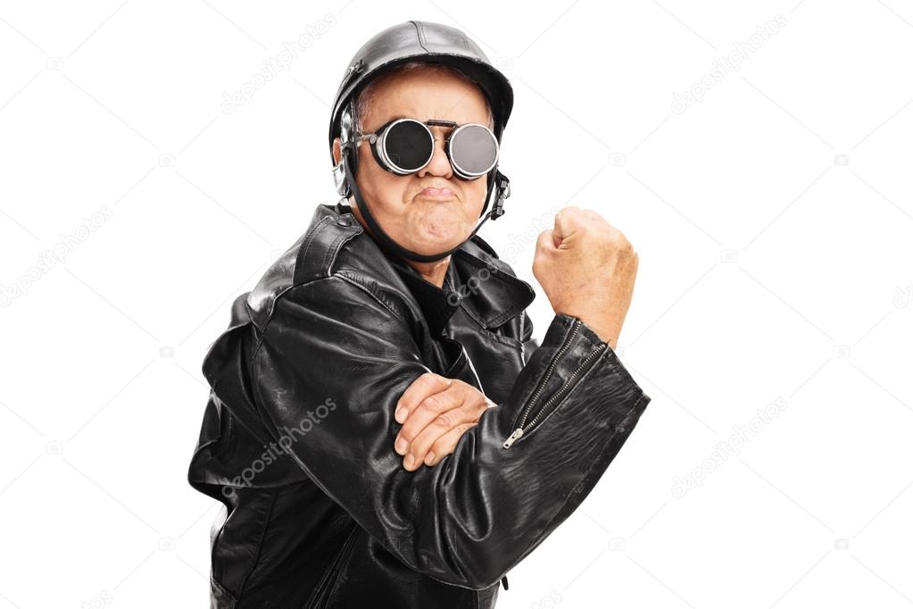 senior biker gesturing with gripped fist