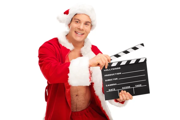 Homem com um traje de Papai Noel segurando um aplauso — Fotografia de Stock