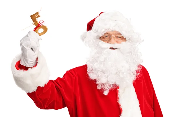 Santa Claus trzymając klucz — Zdjęcie stockowe