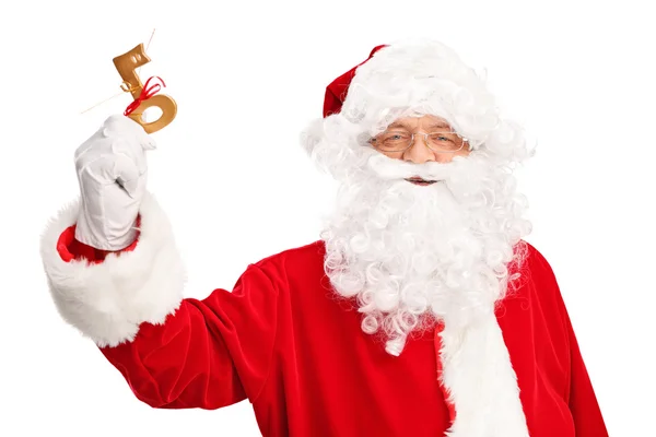 Santa Claus innehar en nyckel — Stockfoto