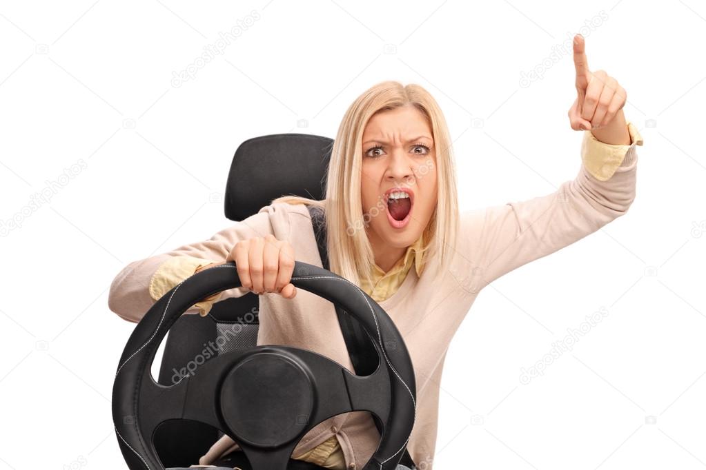 Angry woman driving and shouting 