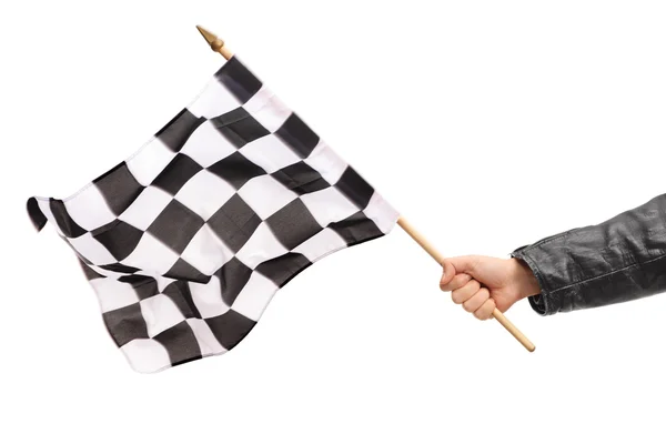 Hand waving en rutig race flagga — Stockfoto