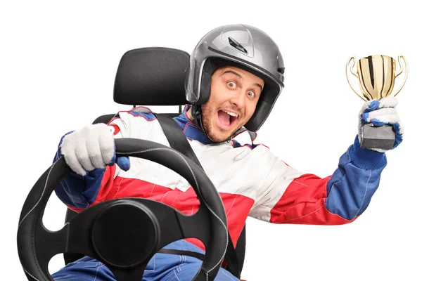 Excited car racer holding a trophy — Stock Photo, Image