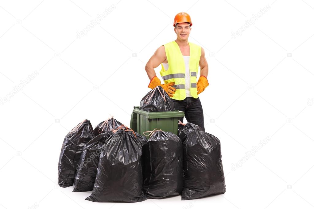 Waste collector behind trash bags