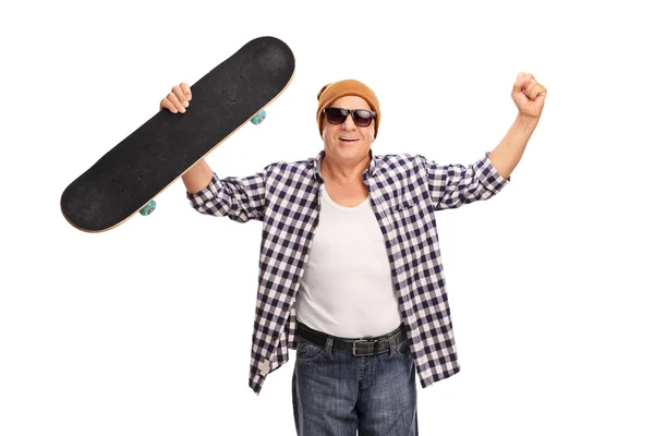 Joyful senior skater celebrating victory — Stock Photo, Image