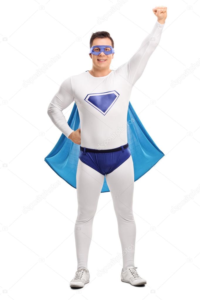 Superhero raising his hand in the air 