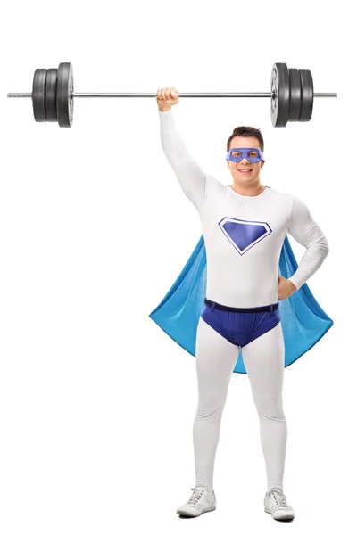 Sterke superheld heffen een zware barbell — Stockfoto