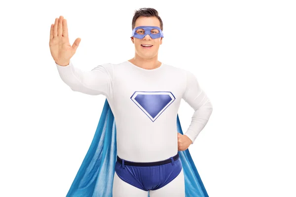 停止ジェスチャーを作るスーパー ヒーロー — ストック写真