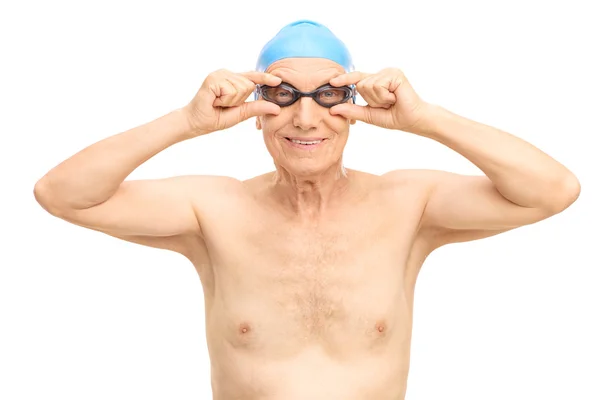 Senior man with black swimming goggles — Stock Photo, Image