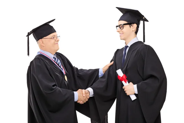 Dean felicitando a un joven estudiante — Foto de Stock