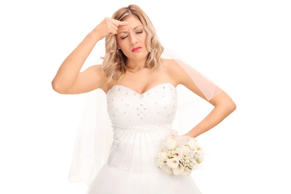 Bride having a headache — Stockfoto